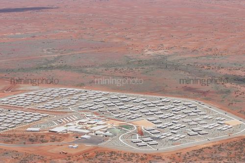 Aerial photo of 3000 person workers camp in iron ore country. - Mining Photo Stock Library