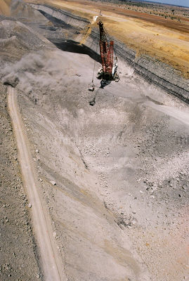 Vertical aerial photo of dragline working in open cut coal mine.  coal seams and high walls clearly visible. - Mining Photo Stock Library