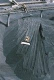 Mining Photo Stock Library - bulldozer stockpiling coal at port facility with coal loader behind aerial vertical image ( Weight: 1  New Image: NO)