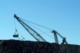 Mining Photo Stock Library - Silhouette of drag line excavator behind stockpiled coal ( Weight: 1  New Image: NO)