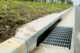 Mining Photo Stock Library - storm water drain and curbing on road at a recently completed subdivision.  shot from road level ( Weight: 1  New Image: NO)
