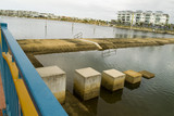 Mining Photo Stock Library - water weir in tidal river amongst residential living ( Weight: 1  New Image: NO)