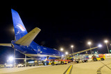 Mining Photo Stock Library - conveyors loading a large cargo plane at night at airport ( Weight: 1  New Image: NO)