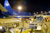 Mining Photo Stock Library - freight being loaded onto cargo plane at airport. shot at night. ( Weight: 3  New Image: NO)