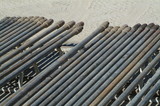 Mining Photo Stock Library - drill rig casing pipe laid out ready to install ( Weight: 1  New Image: NO)