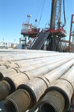Mining Photo Stock Library - pipe casing laid out in front of drill rig ( Weight: 1  New Image: NO)
