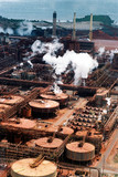 Mining Photo Stock Library - aerial of bauxite refinery with port in background. ( Weight: 3  New Image: NO)