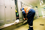 Mining Photo Stock Library - mine worker changing boots in locker room ( Weight: 5  New Image: NO)