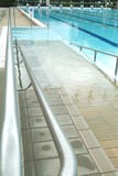 Mining Photo Stock Library - handicapped disabled access ramp into public swimming pool ( Weight: 5  New Image: NO)