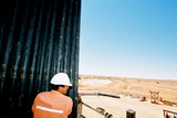 Mining Photo Stock Library - drill rig worker stacking pipe on the platform ( Weight: 1  New Image: NO)