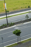 Mining Photo Stock Library - closeup looking across double lane road with nature strip planting ( Weight: 4  New Image: NO)