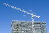 Mining Photo Stock Library - crane on building site with blue sky behind. very clean shot. ( Weight: 1  New Image: NO)