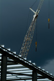 Mining Photo Stock Library - crane on steel construction site shot with storm in background. close up , good line and form. ( Weight: 5  New Image: NO)