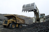 Mining Photo Stock Library - excavator loading coal from the open cut seam floor into a haul truck.  shot up close. ( Weight: 4  New Image: NO)