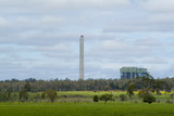 Mining Photo Stock Library - coal fired power station  in distance with prominent smokestck adjacent.  green fields in foreground. ( Weight: 2  New Image: NO)