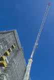Mining Photo Stock Library - tower crane at a multi level building site. deep blue sky behind ( Weight: 1  New Image: NO)