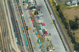 Mining Photo Stock Library - ship containers being loaded by forklift onto heavy rail at transport yard. aerial shot ( Weight: 3  New Image: NO)