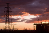 Mining Photo Stock Library - sunset Silhouette image of traffic moving on large bridge. giant powerlines nearby. great colour in sky. ( Weight: 3  New Image: NO)