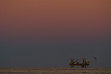 Mining Photo Stock Library - offshore desalination plant drill rig working close to shore. shot at sunset, good colours. ( Weight: 3  New Image: NO)