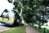 Mining Photo Stock Library - generic shot of a council bus in leafy street at a bus stop. footpath and park adjacent. ( Weight: 3  New Image: NO)