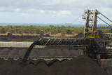 Mining Photo Stock Library - coal pouring off the end of a reclaimer conveyor onto a stockpile at shipping terminal. ( Weight: 3  New Image: NO)