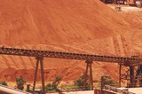 Mining Photo Stock Library - large bauxite stockpile with loader conveyor in foreground ( Weight: 1  New Image: NO)