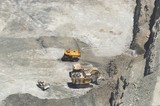 Mining Photo Stock Library - aerial photo of excavator digger front shovel loading overburden from high coal wall into haul truck.  water cart spraying water on wall for dust suppression.  bulldozer adjacent. ( Weight: 1  New Image: NO)