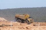 Mining Photo Stock Library - water cart in open cut mine spraying for dust suppression. ( Weight: 1  New Image: NO)