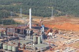 Mining Photo Stock Library - aerial shot of bauxite alumina refinery.  bauxite stockpiles in background.  giant processing plant. ( Weight: 1  New Image: NO)