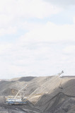 Mining Photo Stock Library - vertical photo of a dragline moving overburden in open cut coal mine Queensland.  plenty of space for copy above in sky. ( Weight: 1  New Image: NO)