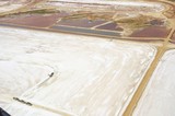 Mining Photo Stock Library - aerial photo of multi trailer haul truck being loaded in salt plains. wide shot. ( Weight: 1  New Image: NO)