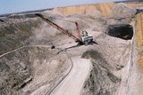 Mining Photo Stock Library - aerial photo of dragline in open cut coal mine with light vehicle adjacent for scale.  Excavator moving coal.  ( Weight: 1  New Image: NO)