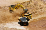 Mining Photo Stock Library - Close up photo of excavator loading overburden into haul truck. ( Weight: 1  New Image: NO)