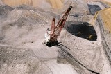 Mining Photo Stock Library - aerial photo of dragline working in open cut coal mine.  coal seams and high walls clearly visible.  digger and truck rotation shifting coal in background. ( Weight: 1  New Image: NO)