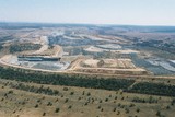 Mining Photo Stock Library - great wide aerial shot of open cut coal mine.  cldarly see stockpiling of overburden, truck and digger rotation, dragline, rehabilitation and mine high walls. ( Weight: 1  New Image: NO)