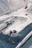 Mining Photo Stock Library - wide aerial vertical photo of excavator loading coal into haul trucks in open cut coal mine. ( Weight: 1  New Image: NO)