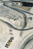 Mining Photo Stock Library - vertical aerial photo of haul trucks at the go line in open cut coal mine.  excavator loading coal in background. ( Weight: 1  New Image: NO)