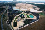 Mining Photo Stock Library - water tailings dam in the shape of a platypus.  aerial photo. ( Weight: 1  New Image: NO)