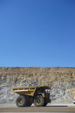 Mining Photo Stock Library - vertical shot of haul truck in open cut coal mine with high walls and blue sky behind. ( Weight: 1  New Image: NO)