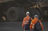 Mining Photo Stock Library - haul truck drivers with their backpacks walking at the begining of the shift to their trucks at the go line. ( Weight: 1  New Image: NO)