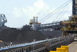 Mining Photo Stock Library - close up photo of coal reclaimers working large stockpiles at coal shipping terminal. ( Weight: 1  New Image: NO)
