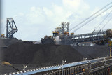 Mining Photo Stock Library - coal reclaimers working stockpiles in coal terminal. ( Weight: 1  New Image: NO)