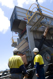 Mining Photo Stock Library - two 2 mine workers in full PPE inspecting a coal hopper at a mine site. ( Weight: 1  New Image: NO)