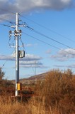 Mining Photo Stock Library - remote electricity pole carrying power overland to mine site.  shot in early morning light. ( Weight: 1  New Image: NO)