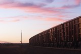 Mining Photo Stock Library - iron ore train passing solar panel instrument tower in early morning light. ( Weight: 1  New Image: NO)