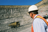 Mining Photo Stock Library - mine site supervisor observing loaded haul truck with coal driving along ramp an access road in open cut coal mine. ( Weight: 1  New Image: NO)