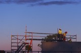 Mining Photo Stock Library - workers in full PPE walking into confined space area from scaffolding platform.  shot during dawn light. ( Weight: 1  New Image: NO)