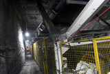 Mining Photo Stock Library - underground conveyor belt and ducting work.  mine site worker walking in background gives scale. ( Weight: 1  New Image: NO)