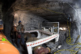 Mining Photo Stock Library - workers in full PPE working together in underground coal mine.  mine machinery truck nearby. ( Weight: 1  New Image: NO)