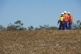 Mining Photo Stock Library - three mine site workers in full PPE in discussion.   ( Weight: 1  New Image: NO)